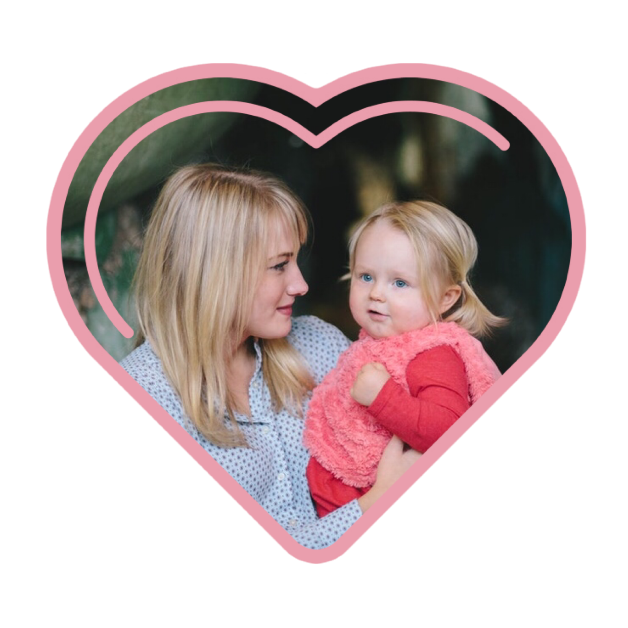 A Woman Holding A Baby In Front Of A Heart Template
