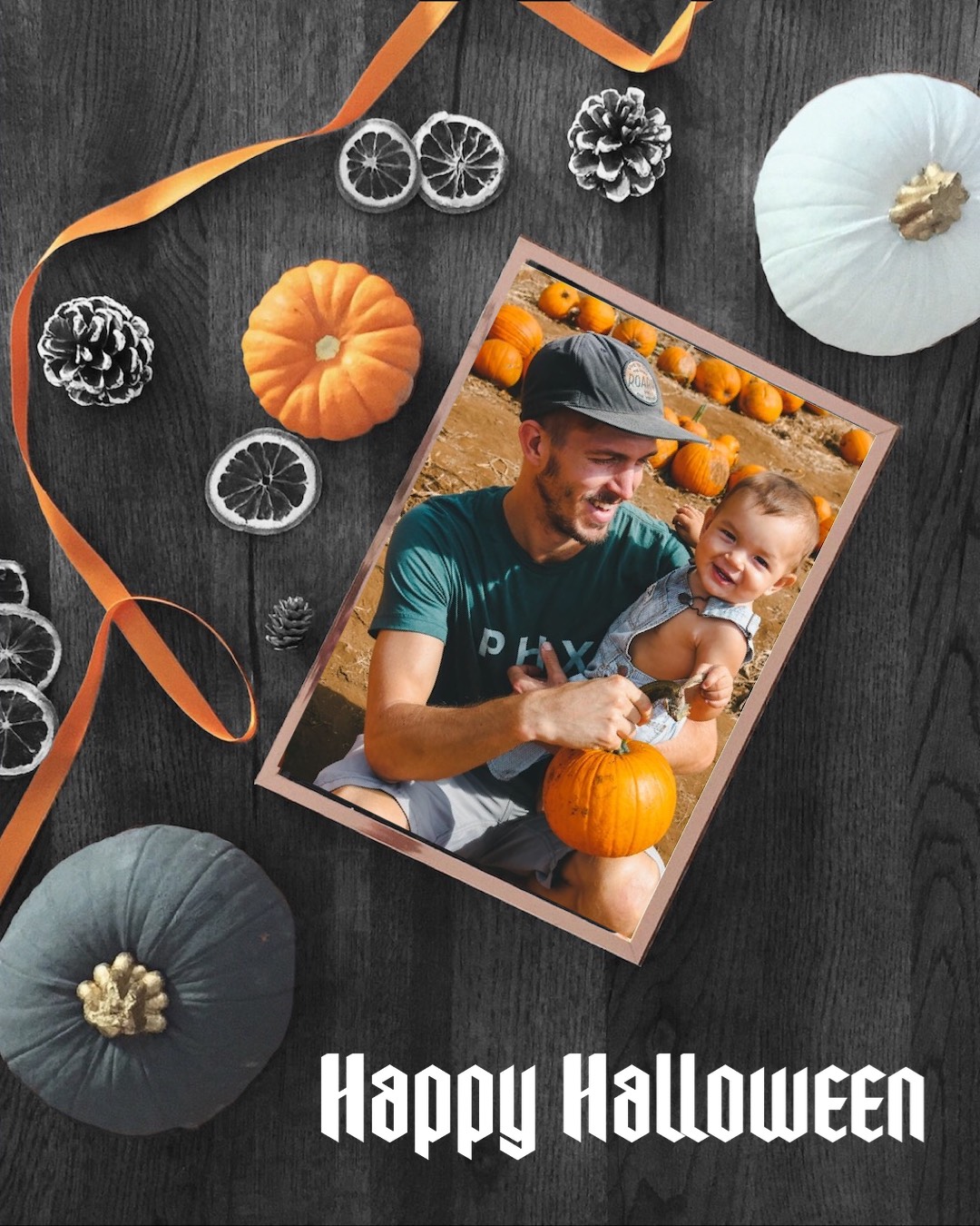 A Man Holding A Baby In Front Of Pumpkins Halloween Template