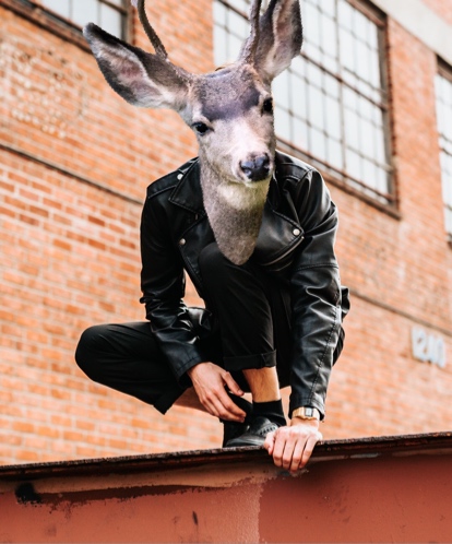 A Man Wearing A Deer Mask On Top Of A Building Collage Art Template